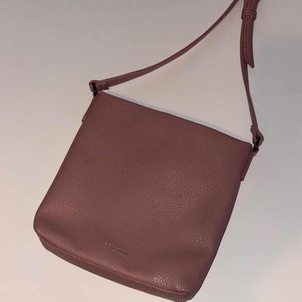 Kenneth Cole Reaction Pink Crossbody Bag with Long Strap and Flap Closure